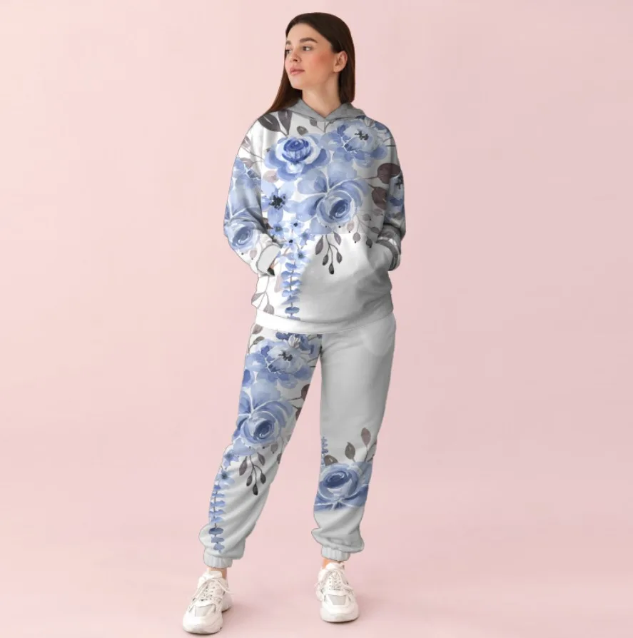 Жіночий білий спортивний костюм із ніжним квітковим принтом 0_011