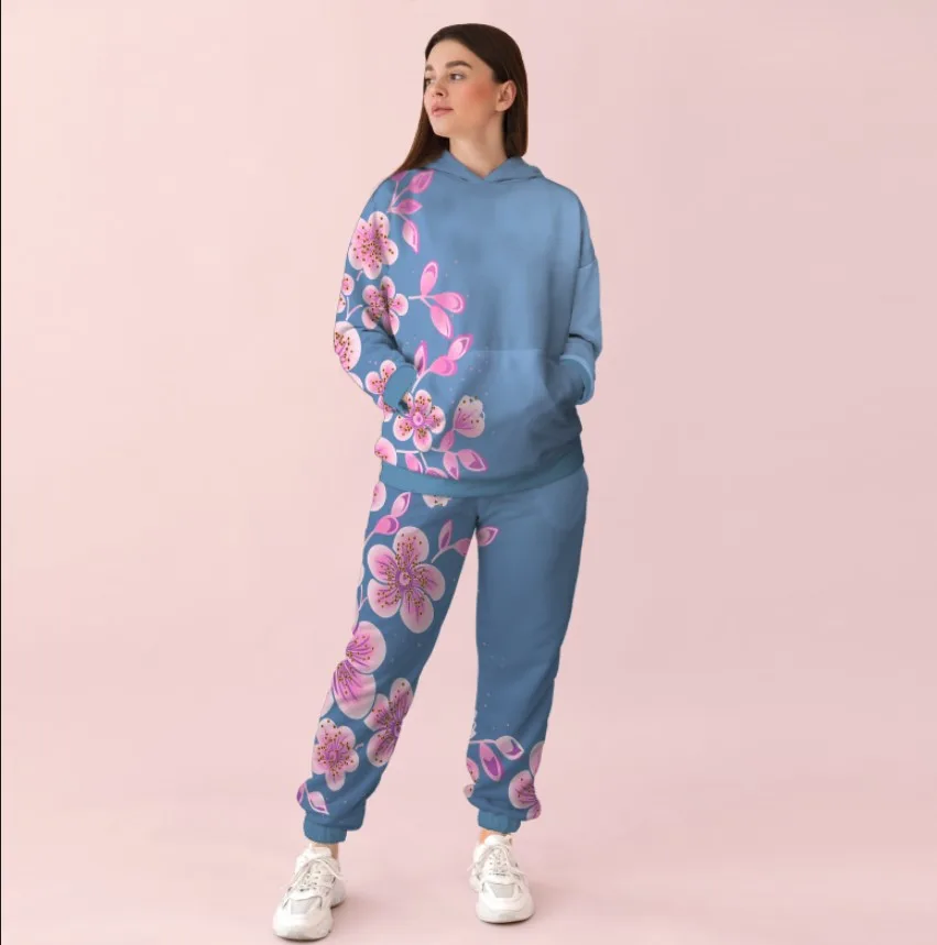 Жіночий спортивний костюм із принтом рожеві квіти на блакитному фоні 0_077